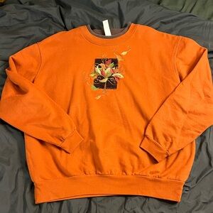 Vintage Orange Crewneck Sweater with Graphic Design